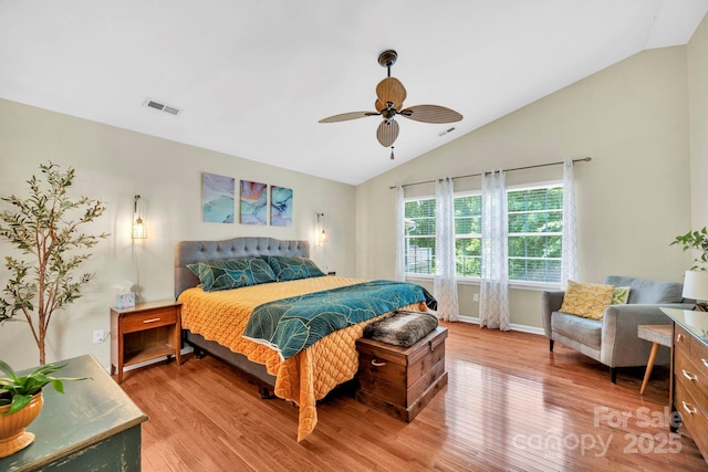 145 Fairway View Dr, Etowah, NC 28729 - bedroom featuring vaulted ceiling, light wood-style floors, a ceiling fan, and baseboards