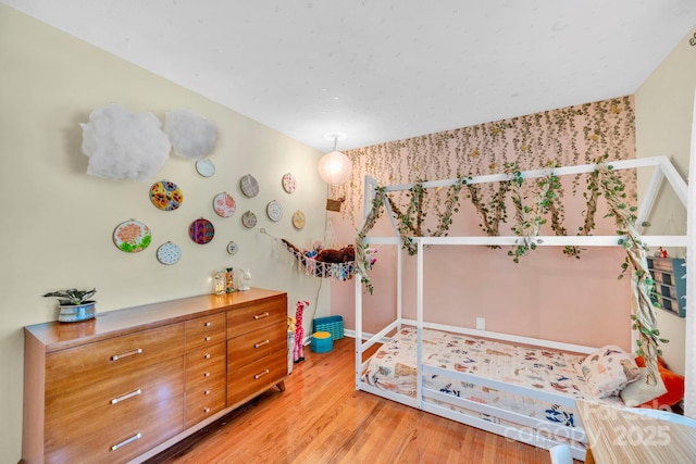 145 Fairway View Dr, Etowah, NC 28729 - bedroom featuring light wood-style flooring, wallpapered walls, and baseboards
