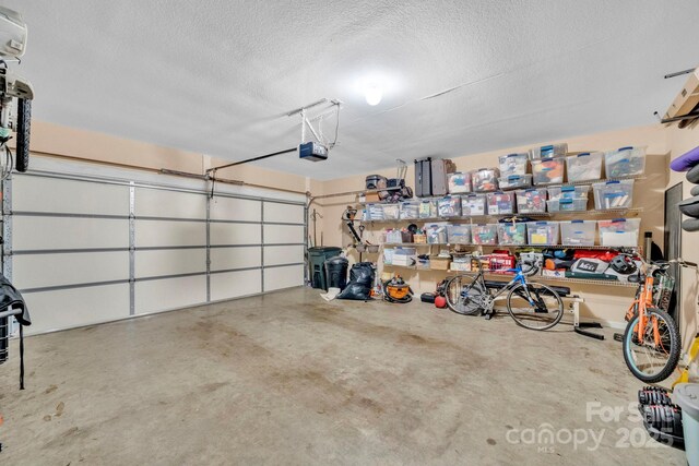 145 Fairway View Dr, Etowah, NC 28729 - garage with a garage door opener