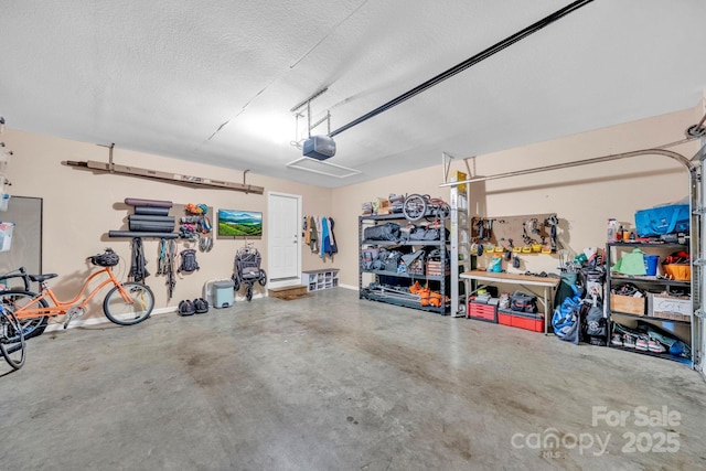 145 Fairway View Dr, Etowah, NC 28729 - garage featuring a garage door opener
