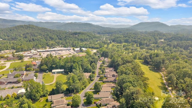 145 Fairway View Dr, Etowah, NC 28729 - aerial view of residential area with a mountainous background and a forest