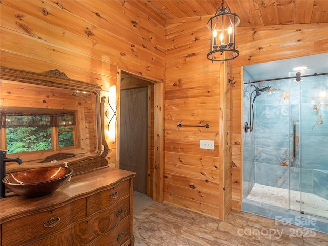 47 Tammy Dr, Maggie Valley, NC 28751 - full bathroom with wooden walls, a shower stall, vanity, a chandelier, and wooden ceiling