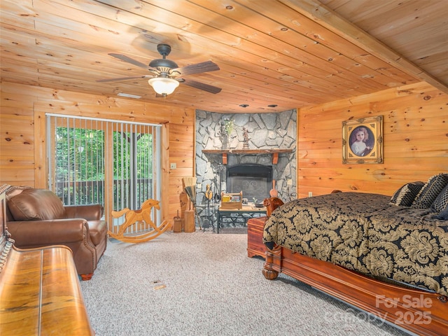 47 Tammy Dr, Maggie Valley, NC 28751 - carpeted bedroom featuring wooden walls, wood ceiling, and access to exterior