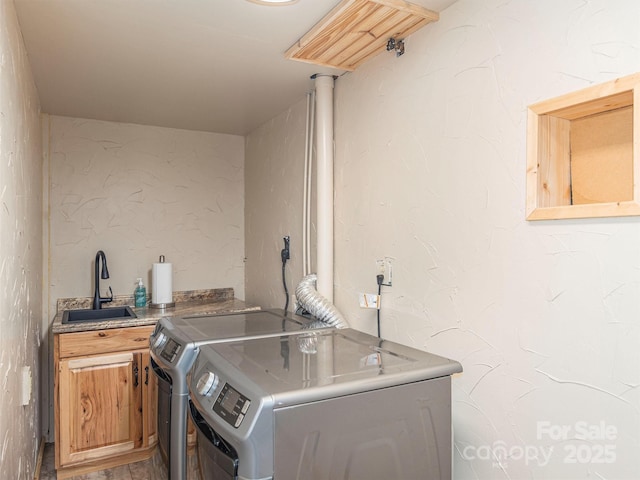47 Tammy Dr, Maggie Valley, NC 28751 - washroom with washing machine and clothes dryer, cabinet space, and a textured wall