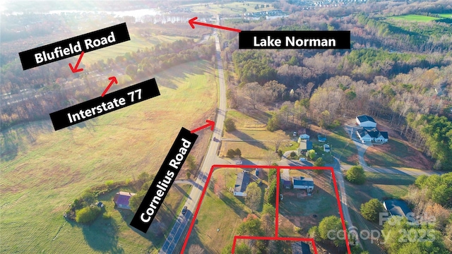 456 Cornelius Rd, Mooresville, NC 28117 - aerial view of property's location featuring property boundaries highlighted and a heavily wooded area