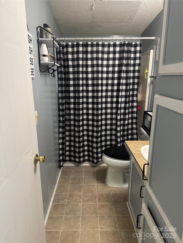 456 Cornelius Rd, Mooresville, NC 28117 - full bathroom featuring a textured ceiling, vanity, and toilet