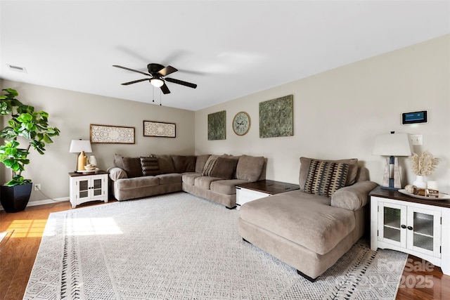 4612 Maple Crest Pl, Harrisburg, NC 28075 - living room featuring wood finished floors, a ceiling fan, and baseboards