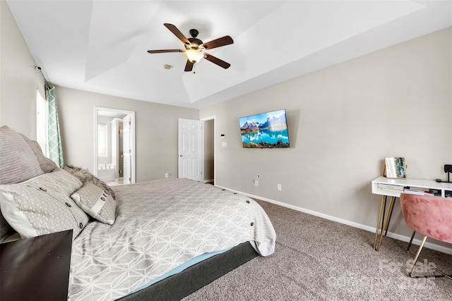 4612 Maple Crest Pl, Harrisburg, NC 28075 - carpeted bedroom with a raised ceiling, connected bathroom, baseboards, and a ceiling fan