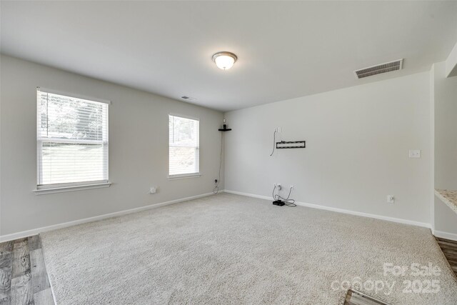 463 W Barr St, Lancaster, SC 29720 - carpeted spare room with baseboards