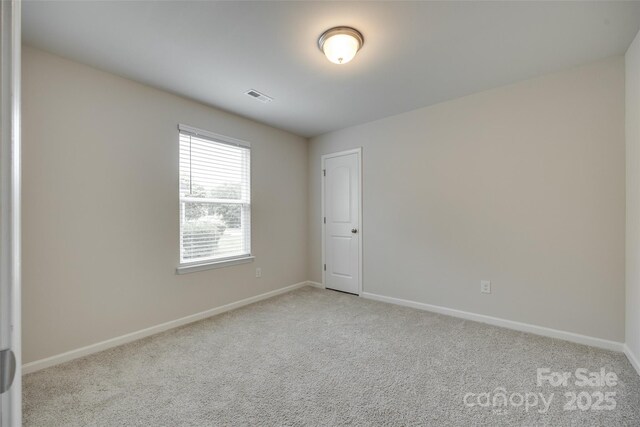 463 W Barr St, Lancaster, SC 29720 - spare room featuring light carpet and baseboards