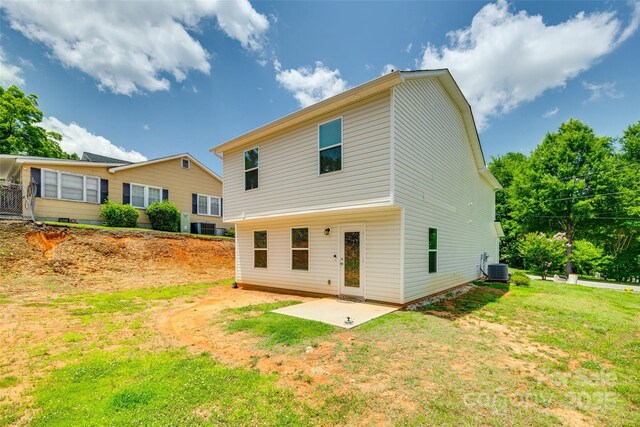 463 W Barr St, Lancaster, SC 29720 - back of house featuring a patio, central AC, and a lawn