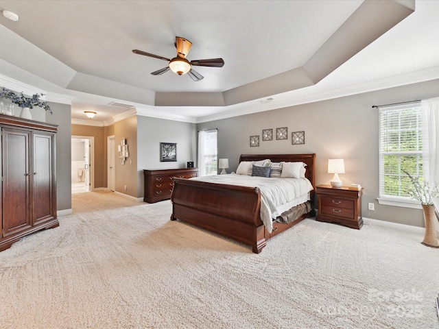 105 Beech Bluff Dr, Mount Holly, NC 28120 - bedroom featuring a raised ceiling, light carpet, crown molding, ceiling fan, and ensuite bathroom