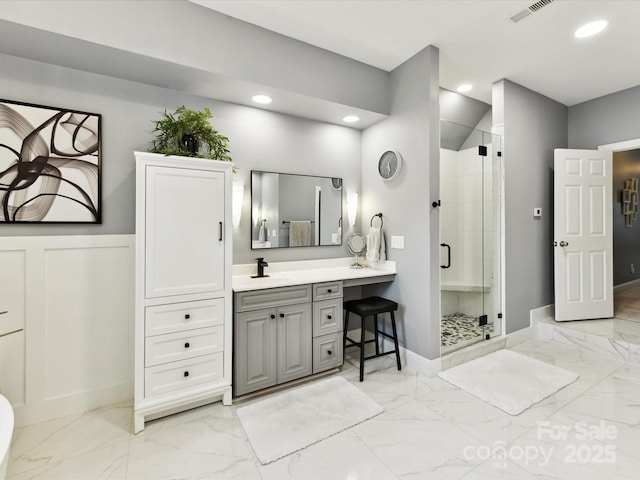 105 Beech Bluff Dr, Mount Holly, NC 28120 - full bath featuring marble look tile flooring, a shower stall, vanity, and recessed lighting