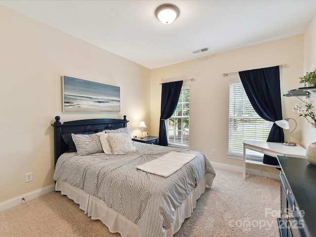 105 Beech Bluff Dr, Mount Holly, NC 28120 - carpeted bedroom featuring baseboards