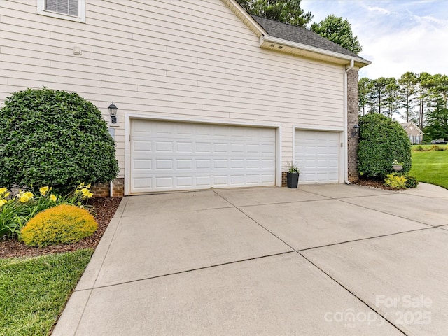 105 Beech Bluff Dr, Mount Holly, NC 28120 - garage featuring driveway