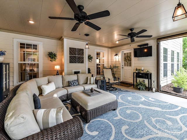 105 Beech Bluff Dr, Mount Holly, NC 28120 - living room featuring a ceiling fan, wooden walls, recessed lighting, and carpet