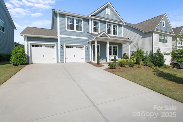 1826 Goodheart Ln, York, SC 29745 - view of front of home with covered porch, concrete driveway, and a front yard