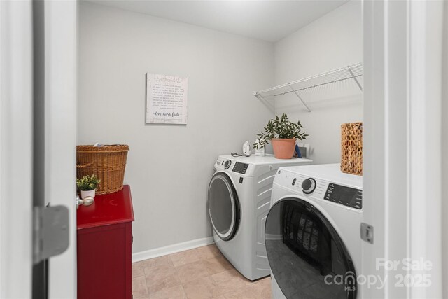 1826 Goodheart Ln, York, SC 29745 - laundry area featuring washing machine and dryer and baseboards