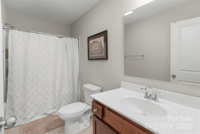 1826 Goodheart Ln, York, SC 29745 - bathroom featuring vanity, toilet, tile patterned floors, and shower / tub combo with curtain