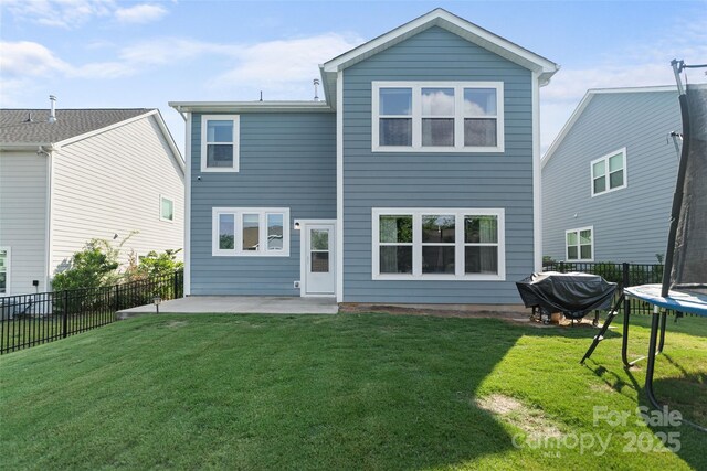 1826 Goodheart Ln, York, SC 29745 - rear view of house featuring a patio and a trampoline
