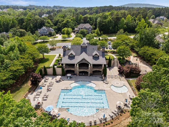 1826 Goodheart Ln, York, SC 29745 - aerial view of property and surrounding area with a pool area and a heavily wooded area