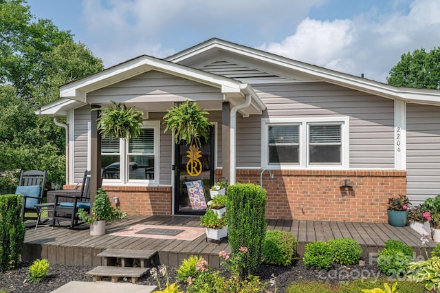 2206 Whitworth Rd, Cherryville, NC 28021 - view of front of property with brick siding and a deck