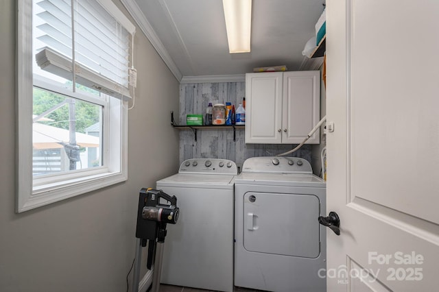 2206 Whitworth Rd, Cherryville, NC 28021 - laundry area featuring washer and clothes dryer, cabinet space, and ornamental molding