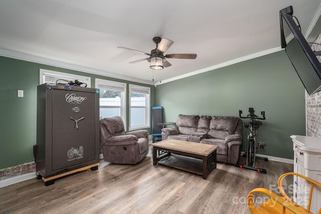 2206 Whitworth Rd, Cherryville, NC 28021 - living area with wood finished floors, crown molding, and a ceiling fan