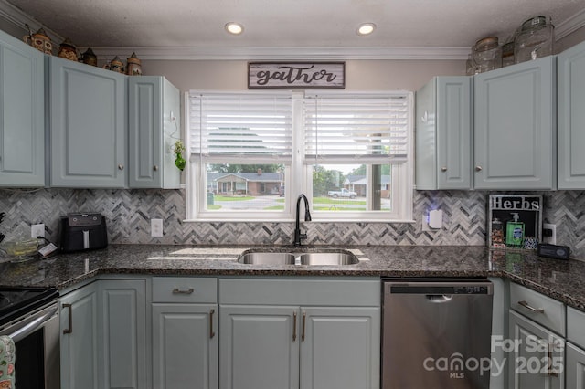 2206 Whitworth Rd, Cherryville, NC 28021 - kitchen with appliances with stainless steel finishes, decorative backsplash, dark stone counters, crown molding, and recessed lighting