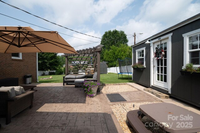 2206 Whitworth Rd, Cherryville, NC 28021 - view of patio featuring a trampoline, an outdoor hangout area, and a pergola