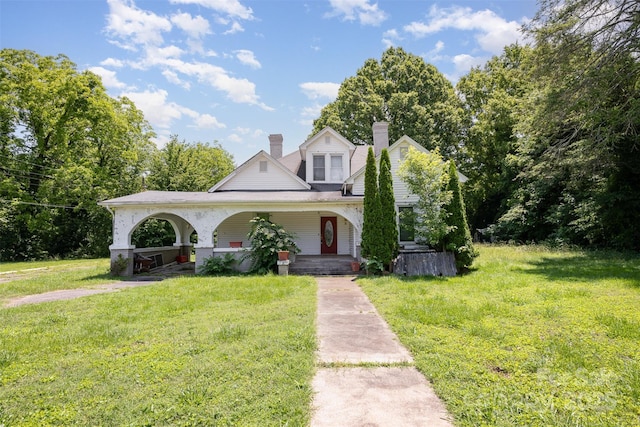 1637 N College Ave, Newton, NC 28658 - view of front facade featuring a porch, a front lawn, and a chimney