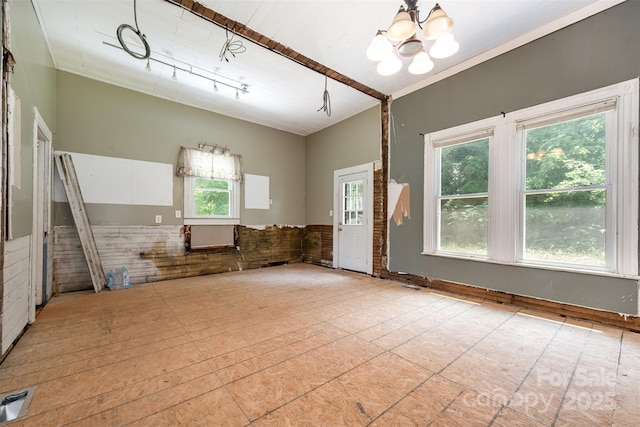 1637 N College Ave, Newton, NC 28658 - unfurnished room featuring a chandelier and a wainscoted wall
