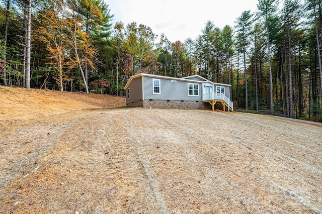 122 River Ridge Lane, Hickory, NC 28601 - manufactured / mobile home featuring crawl space and a forest view