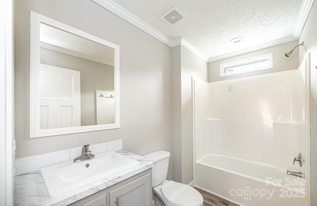 122 River Ridge Lane, Hickory, NC 28601 - bathroom with toilet, vanity, crown molding, a textured ceiling, and shower / bathtub combination