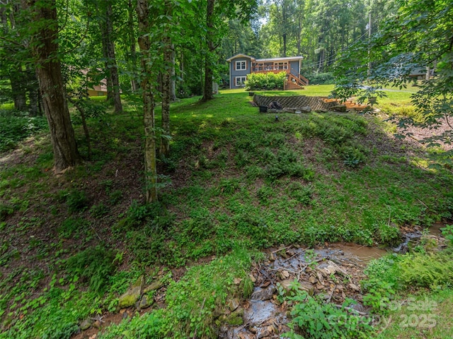 1903 Mauney Cove Rd, Waynesville, NC 28786 - view of yard with a deck and a forest view