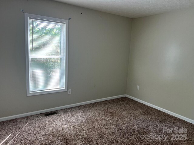 22 Congress St, Granite Falls, NC 28630 - empty room with carpet flooring and baseboards