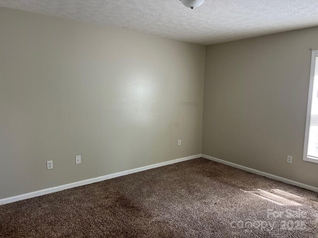 22 Congress St, Granite Falls, NC 28630 - empty room featuring carpet and a textured ceiling