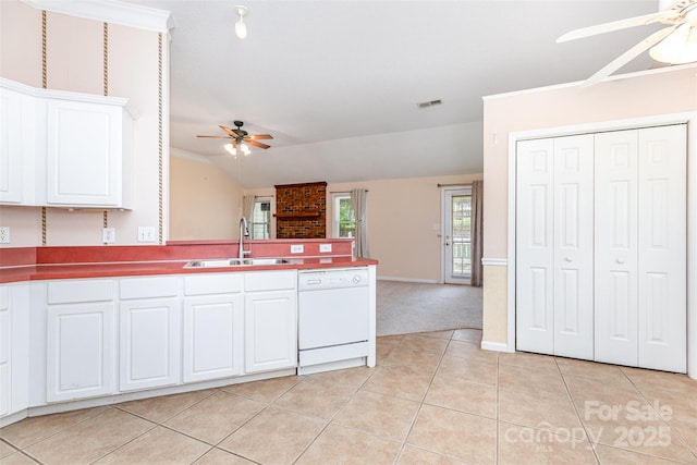 137 Citation Dr, Mooresville, NC 28117 - kitchen with a ceiling fan, white dishwasher, open floor plan, a peninsula, and vaulted ceiling
