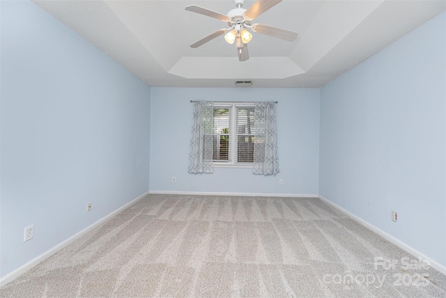 137 Citation Dr, Mooresville, NC 28117 - unfurnished room with a tray ceiling, light carpet, and ceiling fan