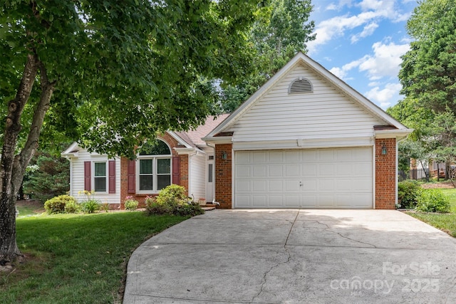 137 Citation Dr, Mooresville, NC 28117 - view of front facade with concrete driveway, brick siding, an attached garage, and a front lawn
