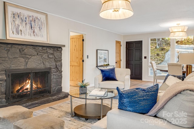 471 Highlands View Rd, Highlands, NC 28741 - living area with wood finished floors, ornamental molding, and a fireplace