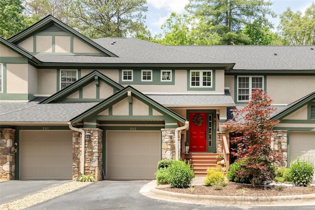 73 Ridgetop Cir Unit 302, Brevard, NC 28712 - view of front of house with stone siding, stucco siding, and roof with shingles