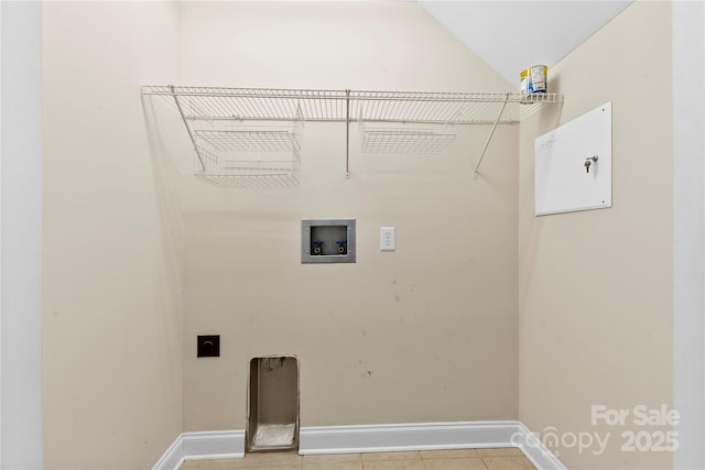 2765 Clover Rd NW, Concord, NC 28027 - washroom with electric dryer hookup, hookup for a washing machine, baseboards, and light tile patterned floors