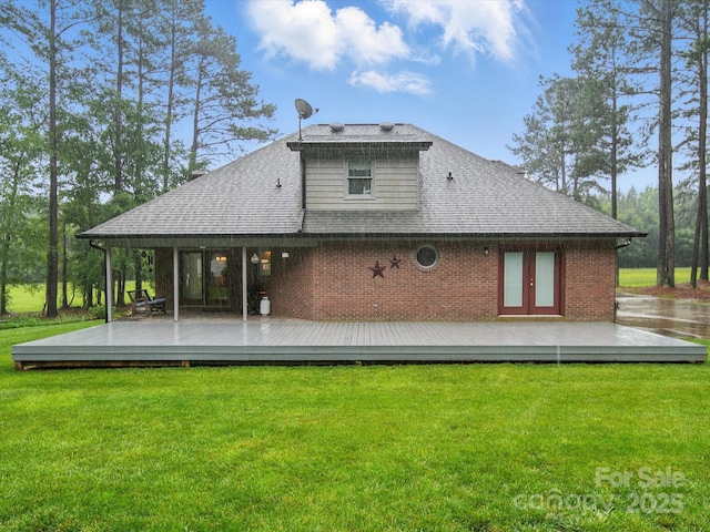 733 Killian Rd, Stanley, NC 28164 - back of property with a yard, a wooden deck, roof with shingles, french doors, and brick siding