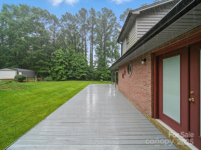 733 Killian Rd, Stanley, NC 28164 - deck featuring a yard and an outbuilding