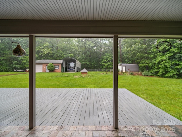 733 Killian Rd, Stanley, NC 28164 - wooden terrace with an outdoor structure and a yard