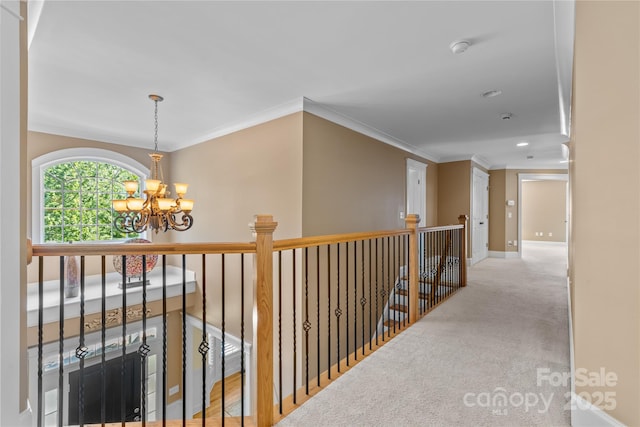 1336 Dobson Dr, Waxhaw, NC 28173 - corridor with a chandelier, carpet flooring, crown molding, and recessed lighting