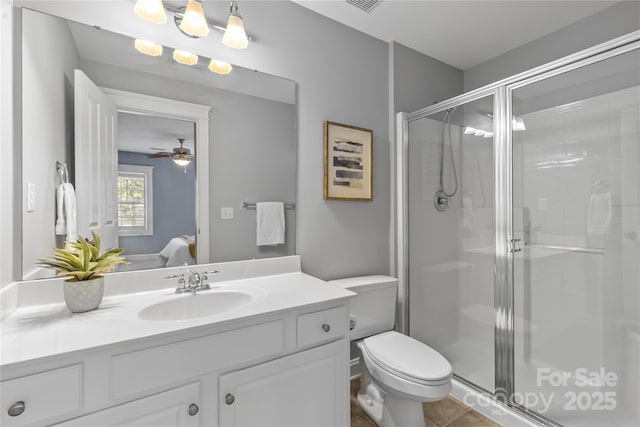 1336 Dobson Dr, Waxhaw, NC 28173 - ensuite bathroom with a stall shower, vanity, tile patterned flooring, and a ceiling fan