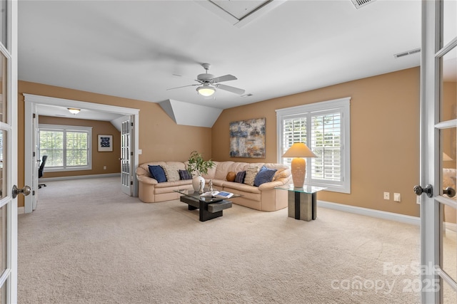 1336 Dobson Dr, Waxhaw, NC 28173 - living area with french doors, carpet floors, and vaulted ceiling