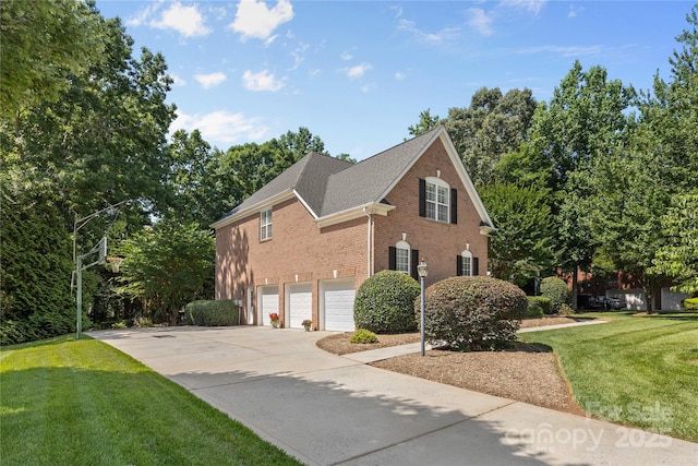 1336 Dobson Dr, Waxhaw, NC 28173 - view of home's exterior featuring an attached garage, brick siding, concrete driveway, a yard, and a shingled roof